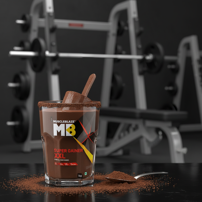 MuscleBlaze Super Gainer XXL dark chocolate shake with gym equipment